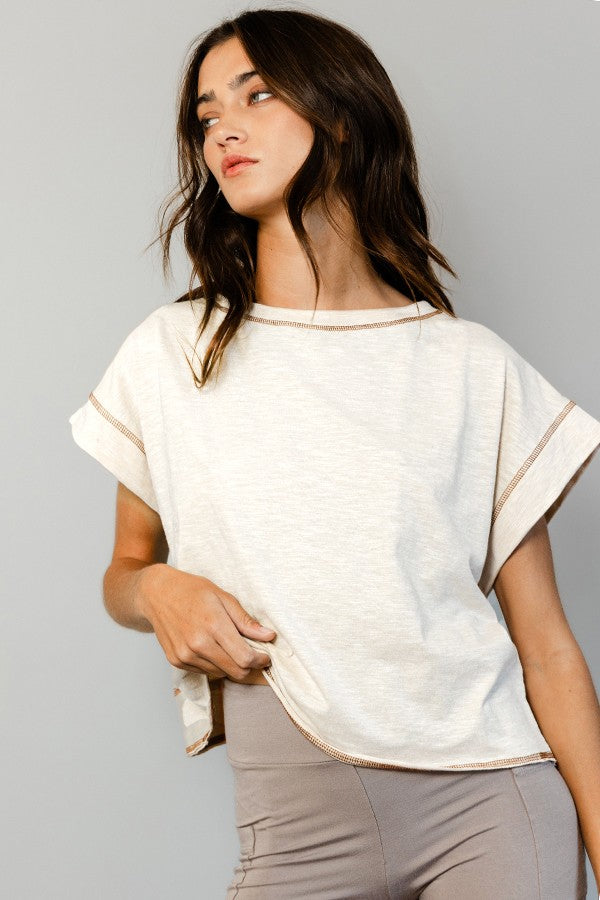 Cream open-back crop top brown reverse stitching