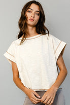 Cream open-back crop top brown reverse stitching