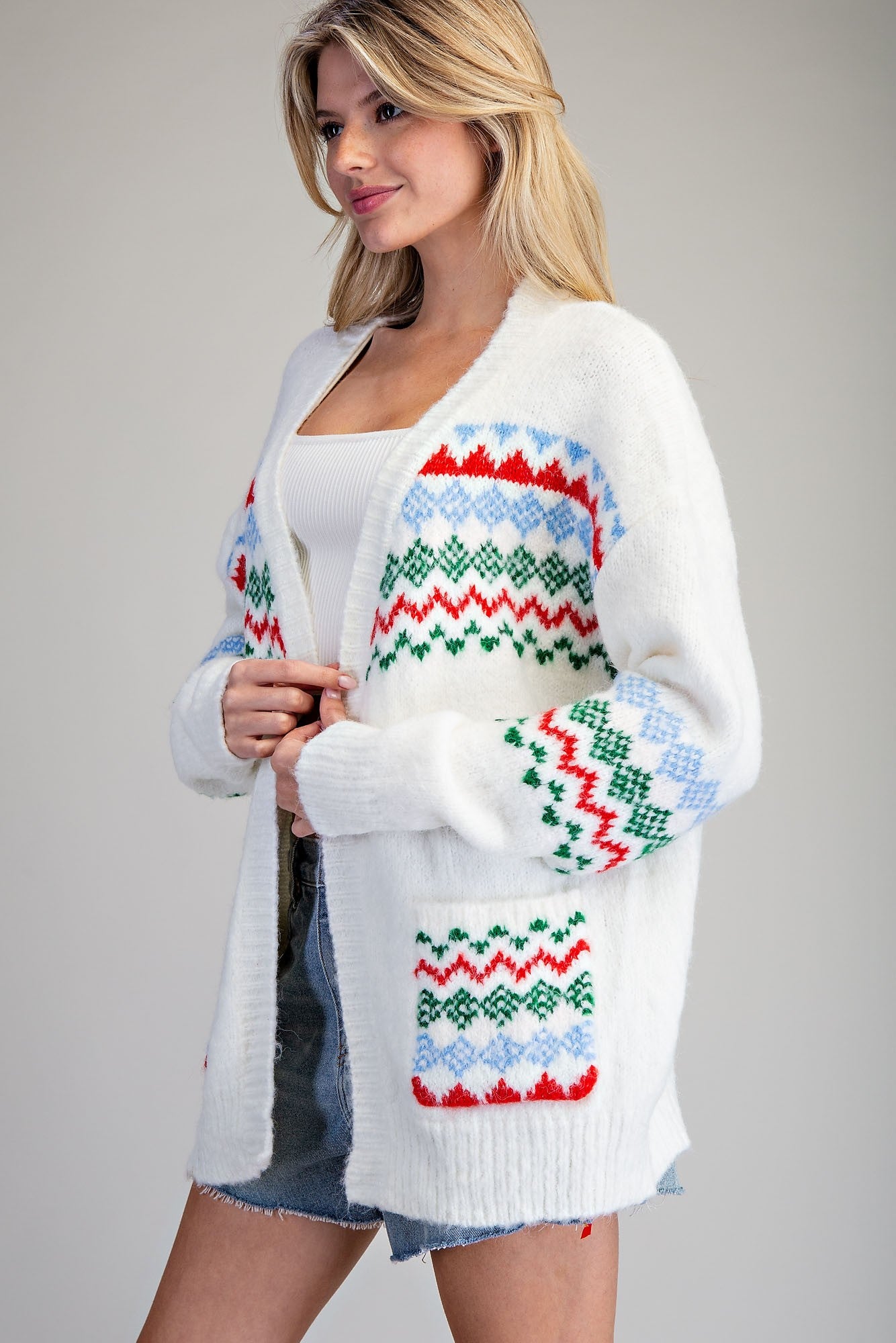 White sweater with Christmas Colored patterned designs Cardigan Sweater