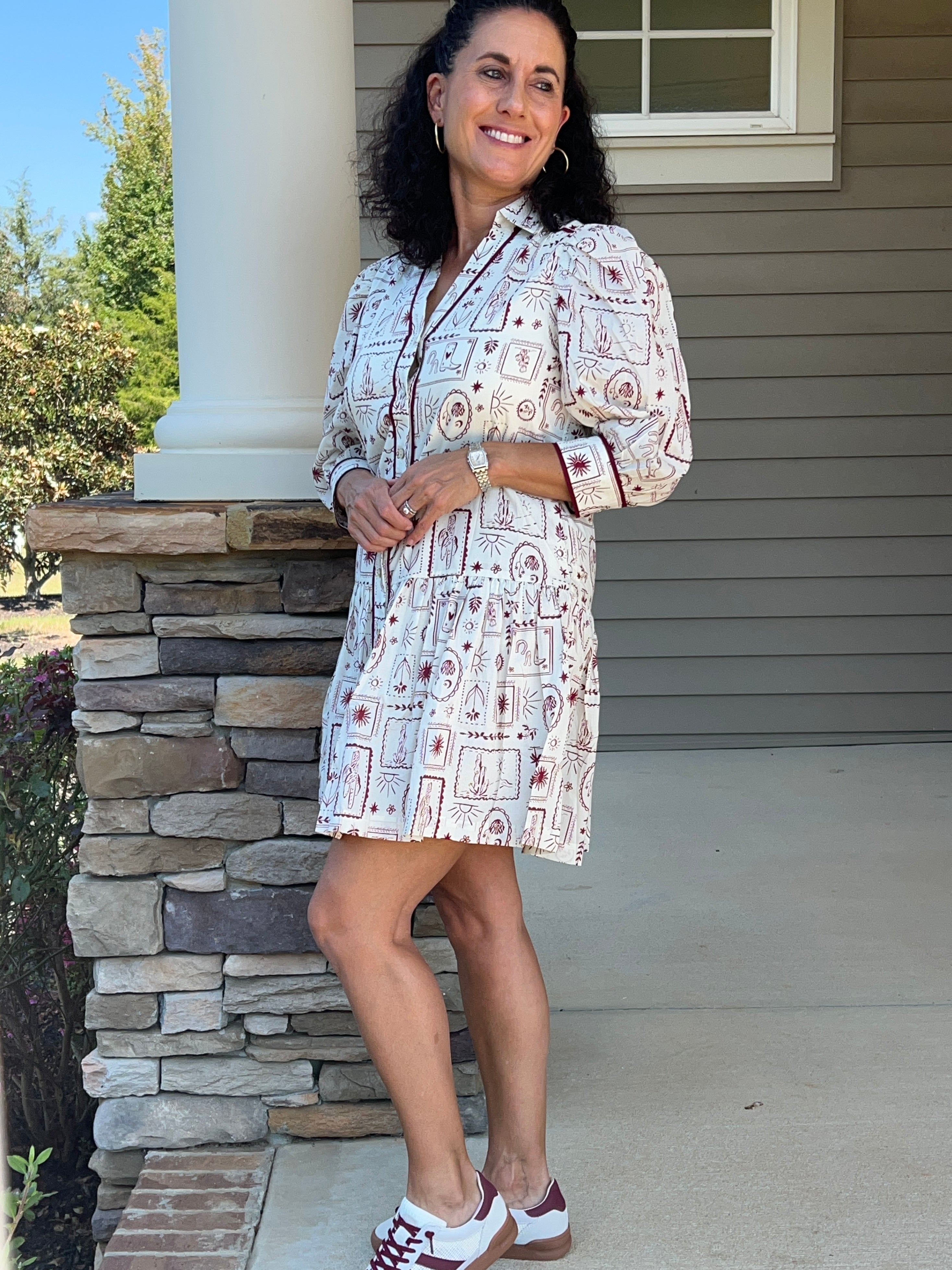 white v-neck dress with garnet colored western designs