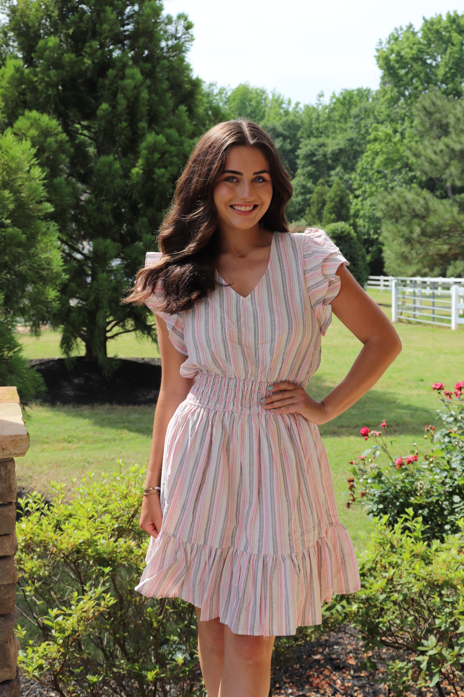 White and pink striped ruffled mini dress