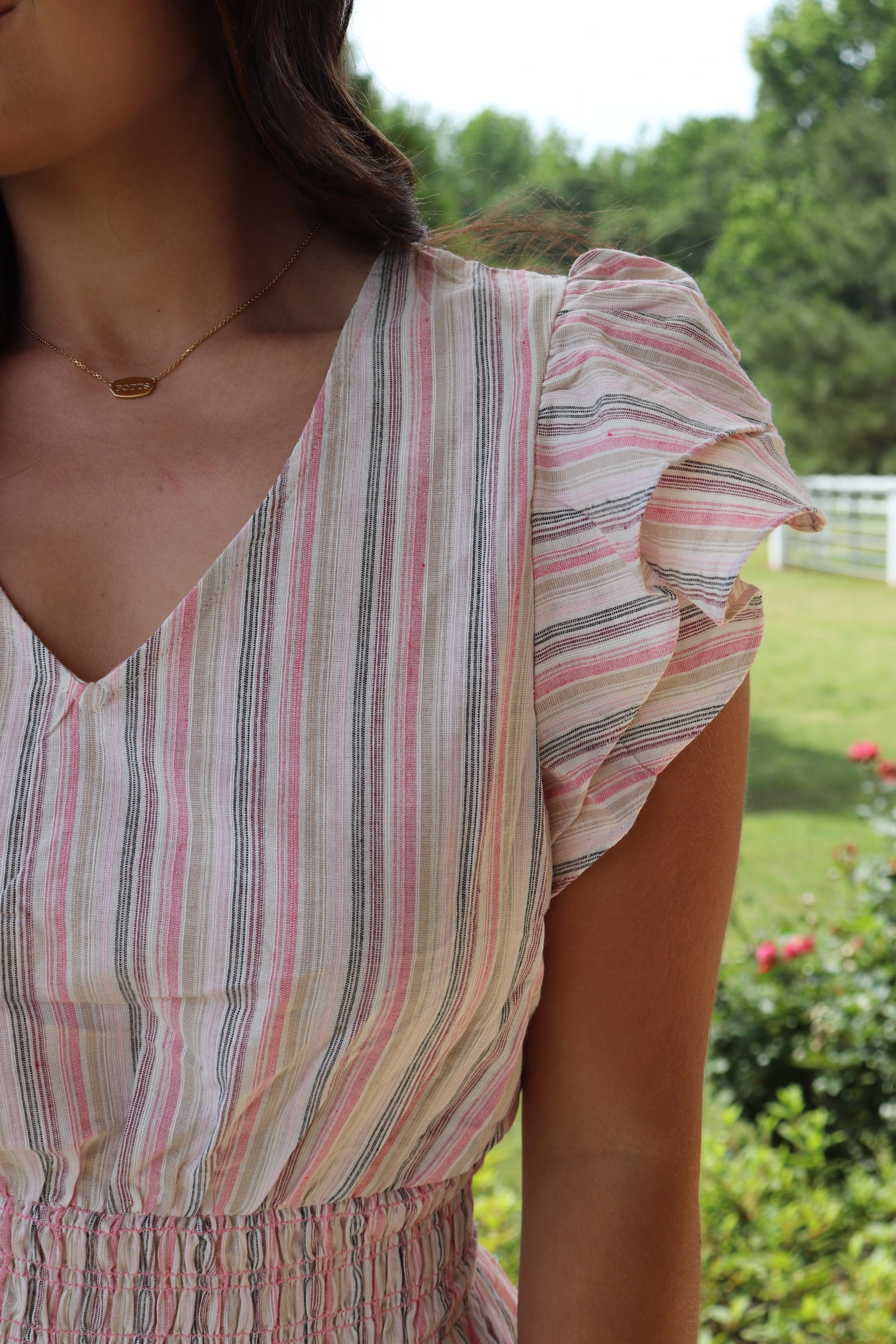 White and pink striped ruffled mini dress