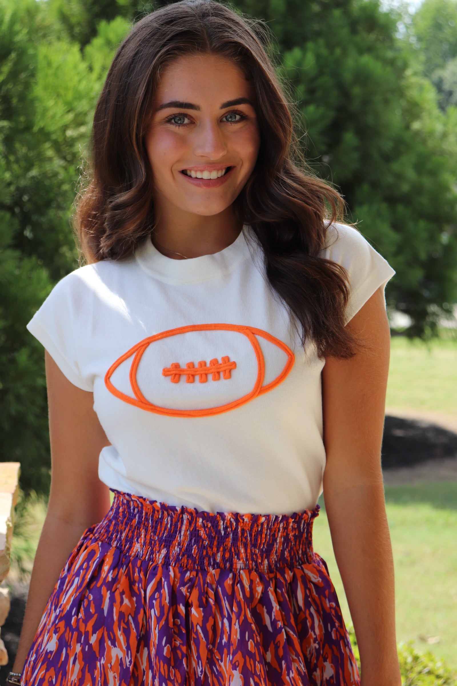 Ivory Cap Sleeve Sweater/Orange Football with purple & orange mini skirt