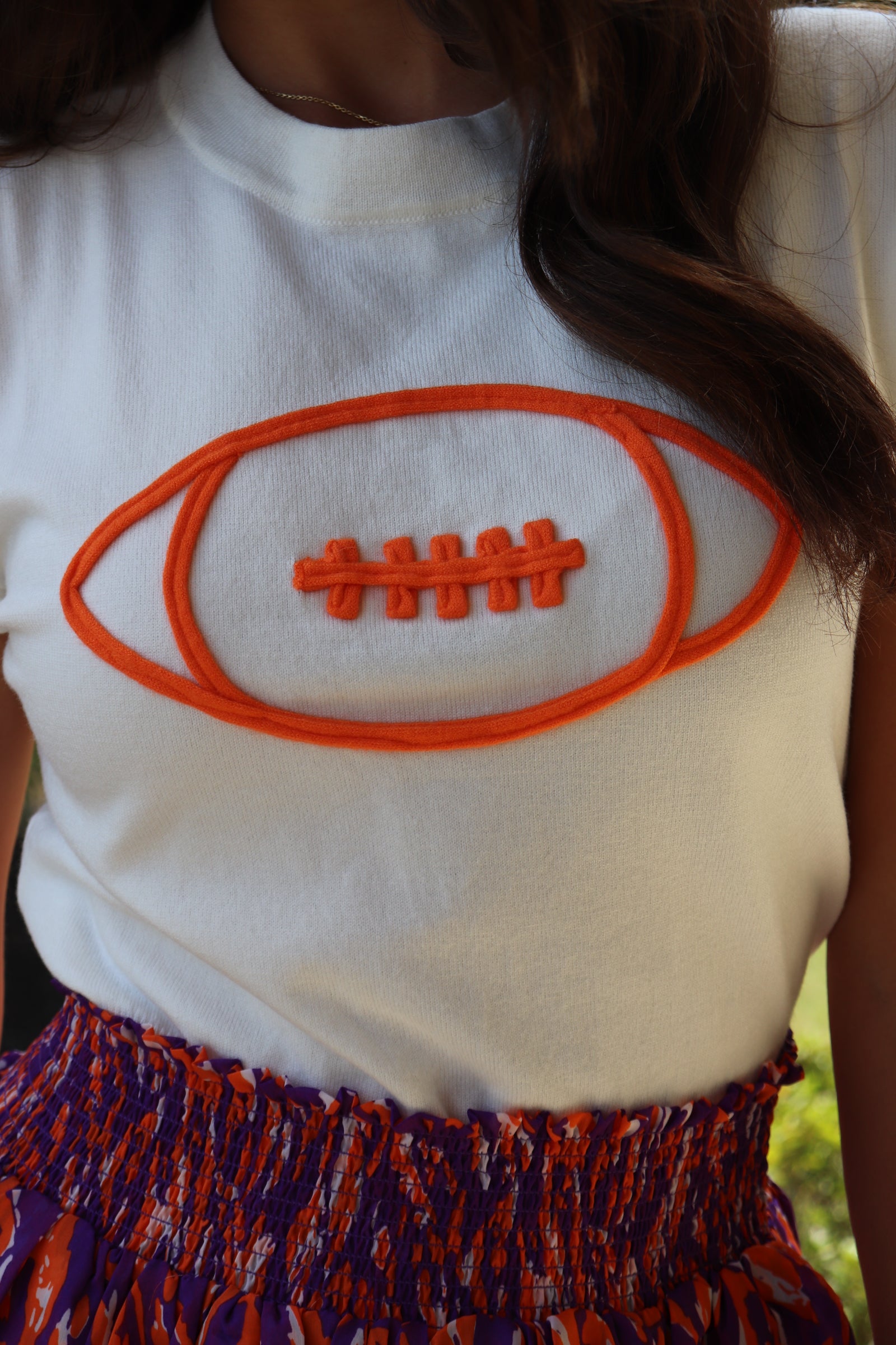 Ivory Cap Sleeve Sweater/Orange Football with purple & orange mini skirt