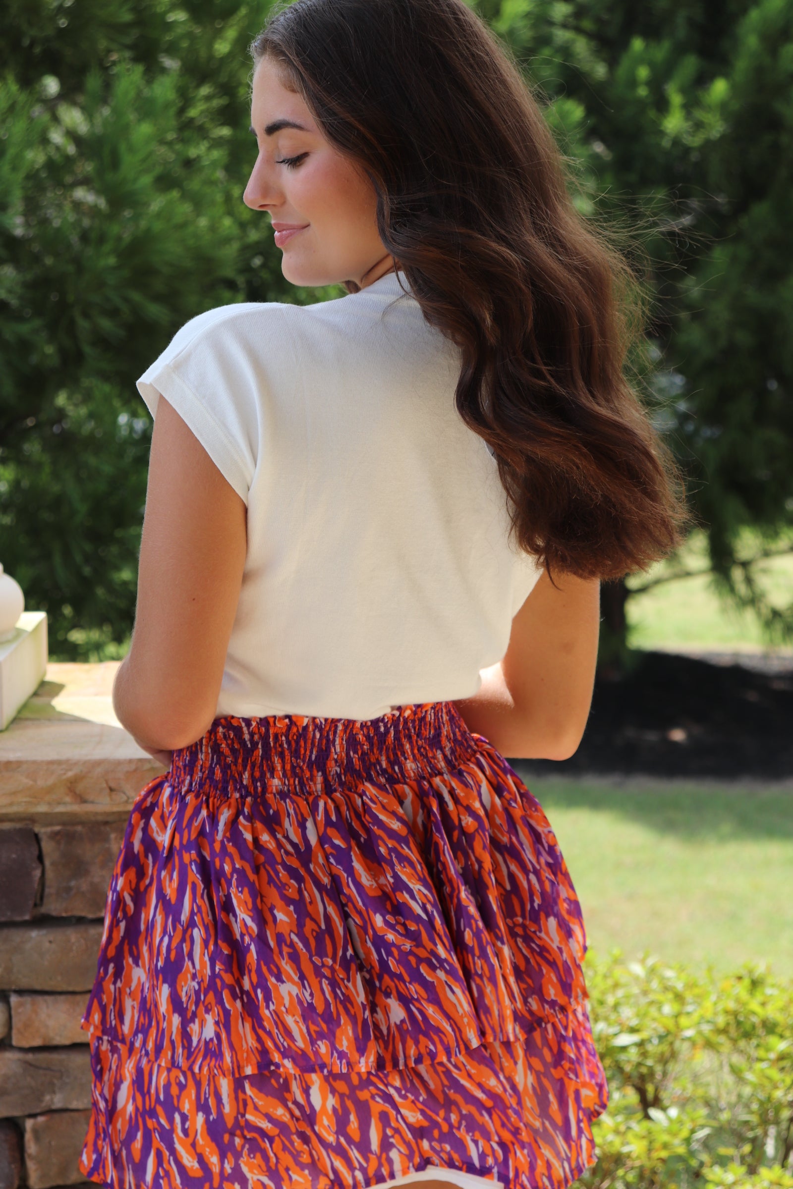 Ivory Cap Sleeve Sweater/Orange Football with purple & orange mini skirt