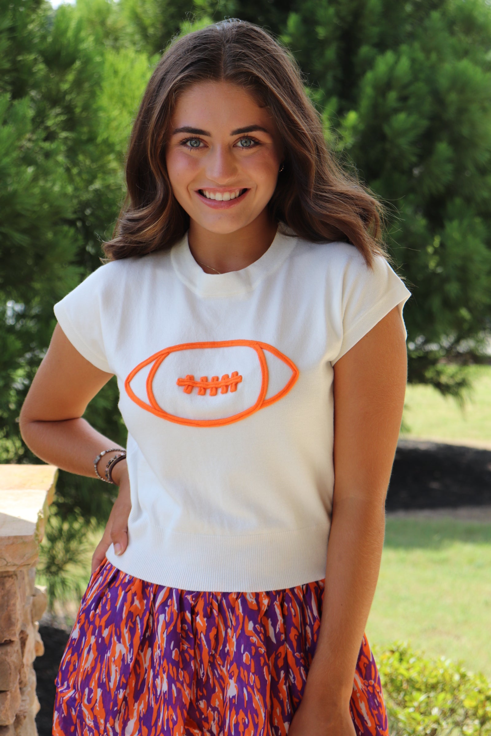 Ivory Cap Sleeve Sweater/Orange Football with purple & orange mini skirt