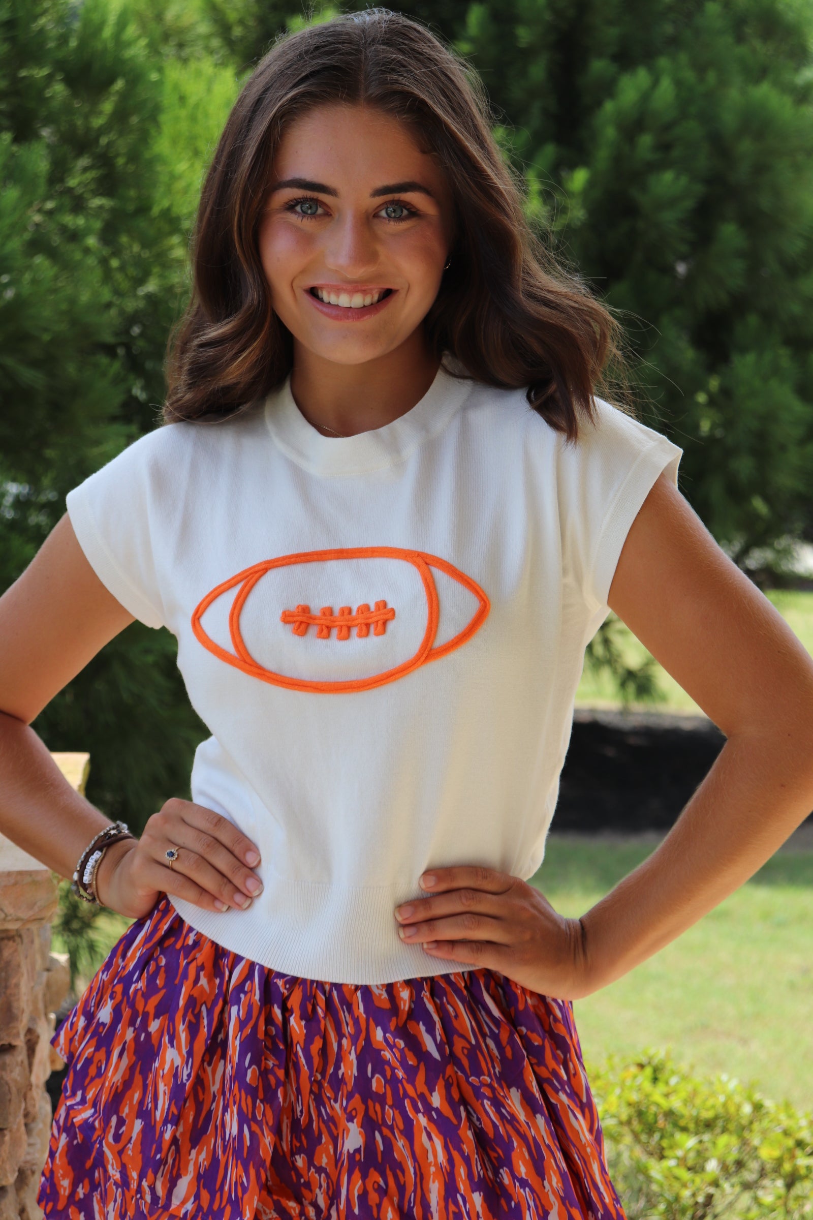 Ivory Cap Sleeve Sweater/Orange Football with purple & orange mini skirt