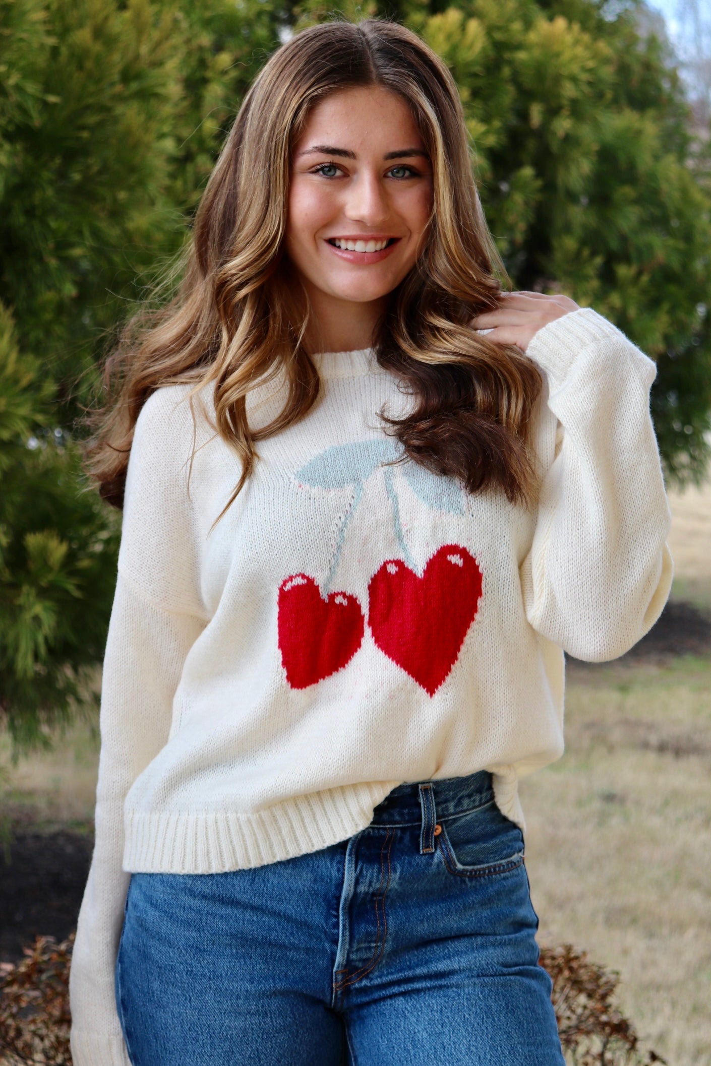 Cream long sleeve sweater with heart shaped red cherries