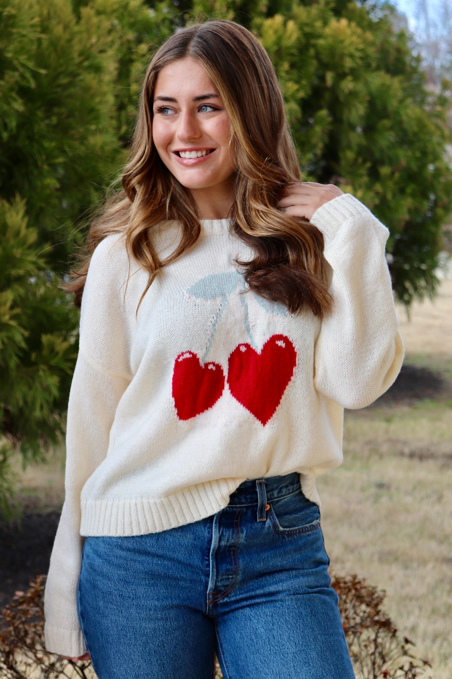 Cream long sleeve sweater with heart shaped red cherries