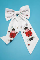 White hairbow with Nutcracker Seed Bead design