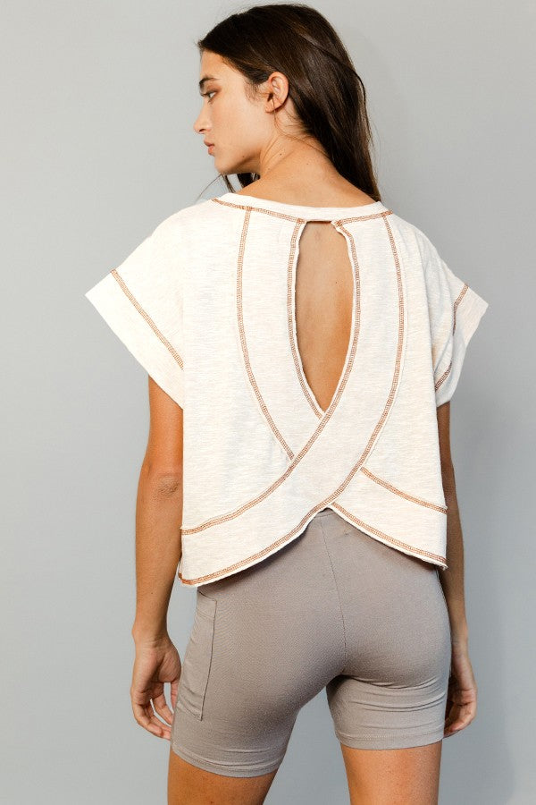Cream open-back crop top brown reverse stitching