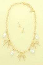 Bow And Baroque Pearl Pendant Necklace