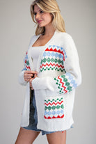 White sweater with Christmas Colored patterned designs Cardigan Sweater