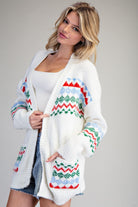 White sweater with Christmas Colored patterned designs Cardigan Sweater