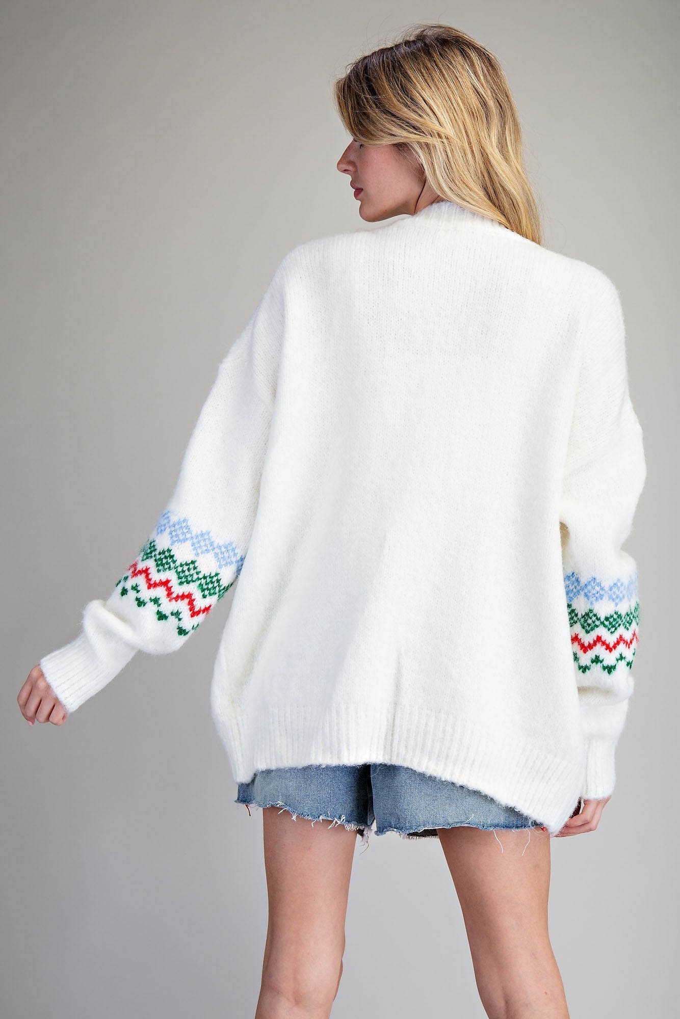 White sweater with Christmas Colored patterned designs Cardigan Sweater