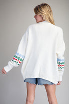 White sweater with Christmas Colored patterned designs Cardigan Sweater