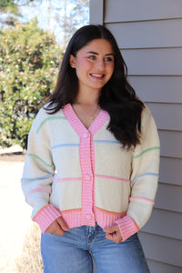 Striped Button Down cream Cardigan with pink trim and pink, blue, green & orange stripes