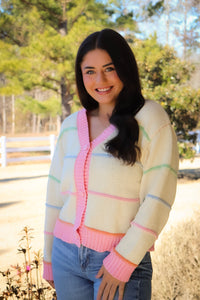 Striped Button Down cream Cardigan with pink trim and pink, blue, green & orange stripes