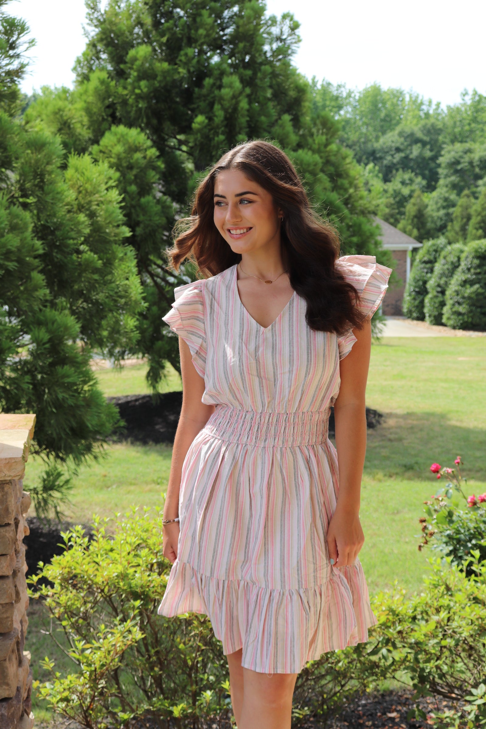 White and pink striped ruffled mini dress