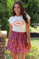 Ivory Cap Sleeve Sweater/Orange Football with purple & orange mini skirt