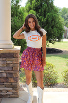 Ivory Cap Sleeve Sweater/Orange Football with purple & orange mini skirt