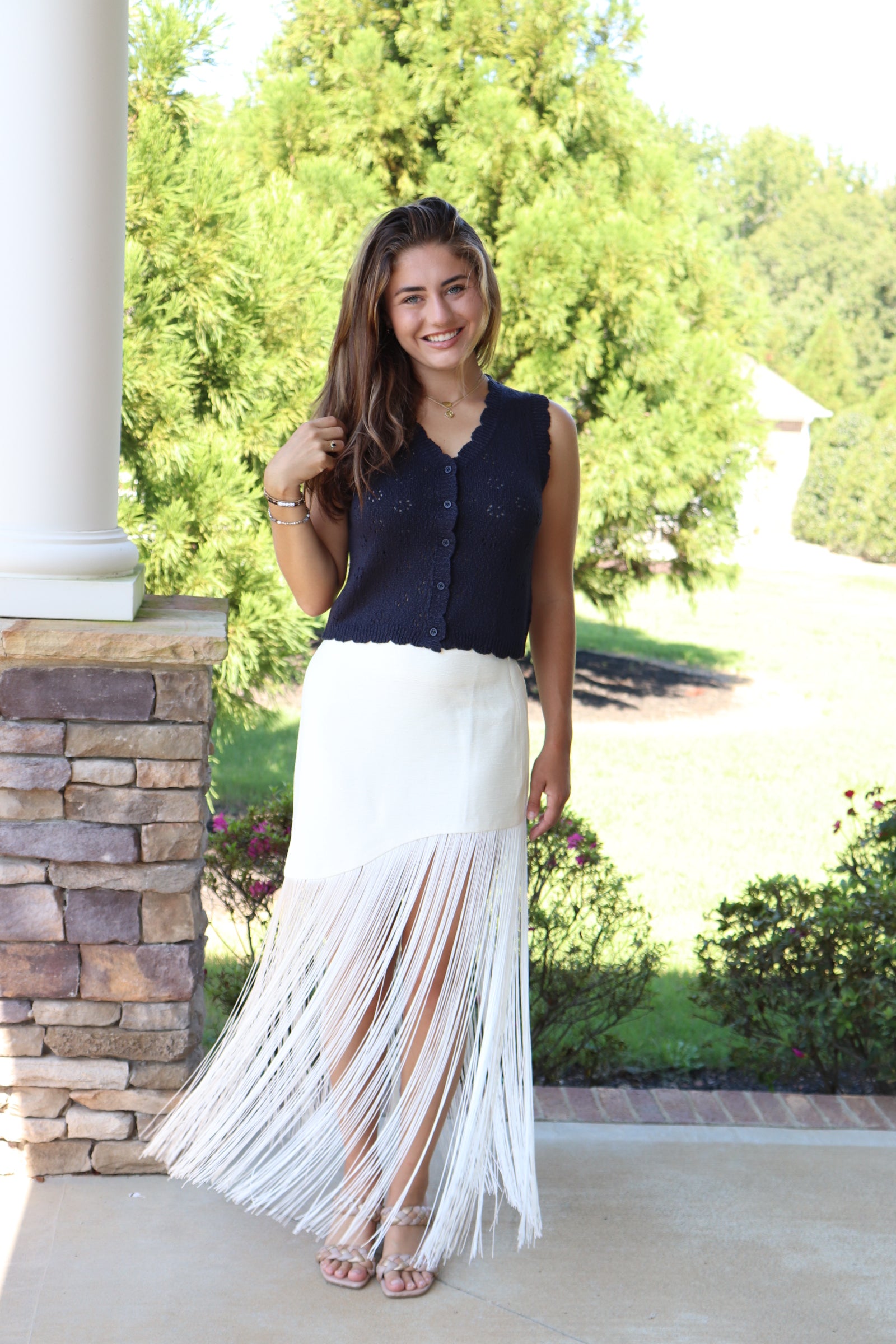Off-White Asymmetric Fringe Maxi Skirt and navy blue short sleeve sweater vest