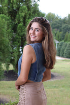Taupe suede skirt with studs and denim cropped vest