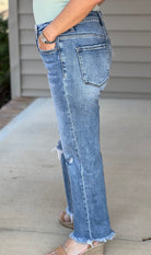 High rise waist, stretch, distressed,, frayed hem, cropped length, slim fit, straight leg jeans 