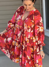 Load image into Gallery viewer,  pinks, reds, and orange florals are artfully combined in a flowy, 3/4 sleeve tiered mini dress. 
