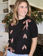 Black short sleeve Christmas Sweater with red Plaid Ribbon Detail
