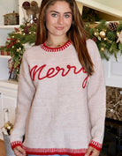 Oatmeal sweater with red embroidered "Merry"