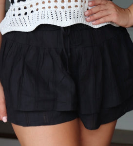 black cotton skirt with built in shorts. Elastic waist