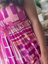 Load image into Gallery viewer, Midi dress. Multiple shades of pink&amp; white abstract design.  Tiered ruffles
