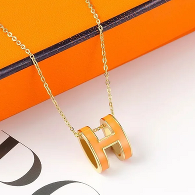 Orange H stainless steel gold colored necklace 