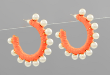 Load image into Gallery viewer, Orange pearl edge raffia wrapped hoops
