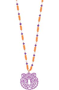 Purple tiger metal pendant on a purple and range beaded chain