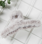 gray fuzzy hair claw clip